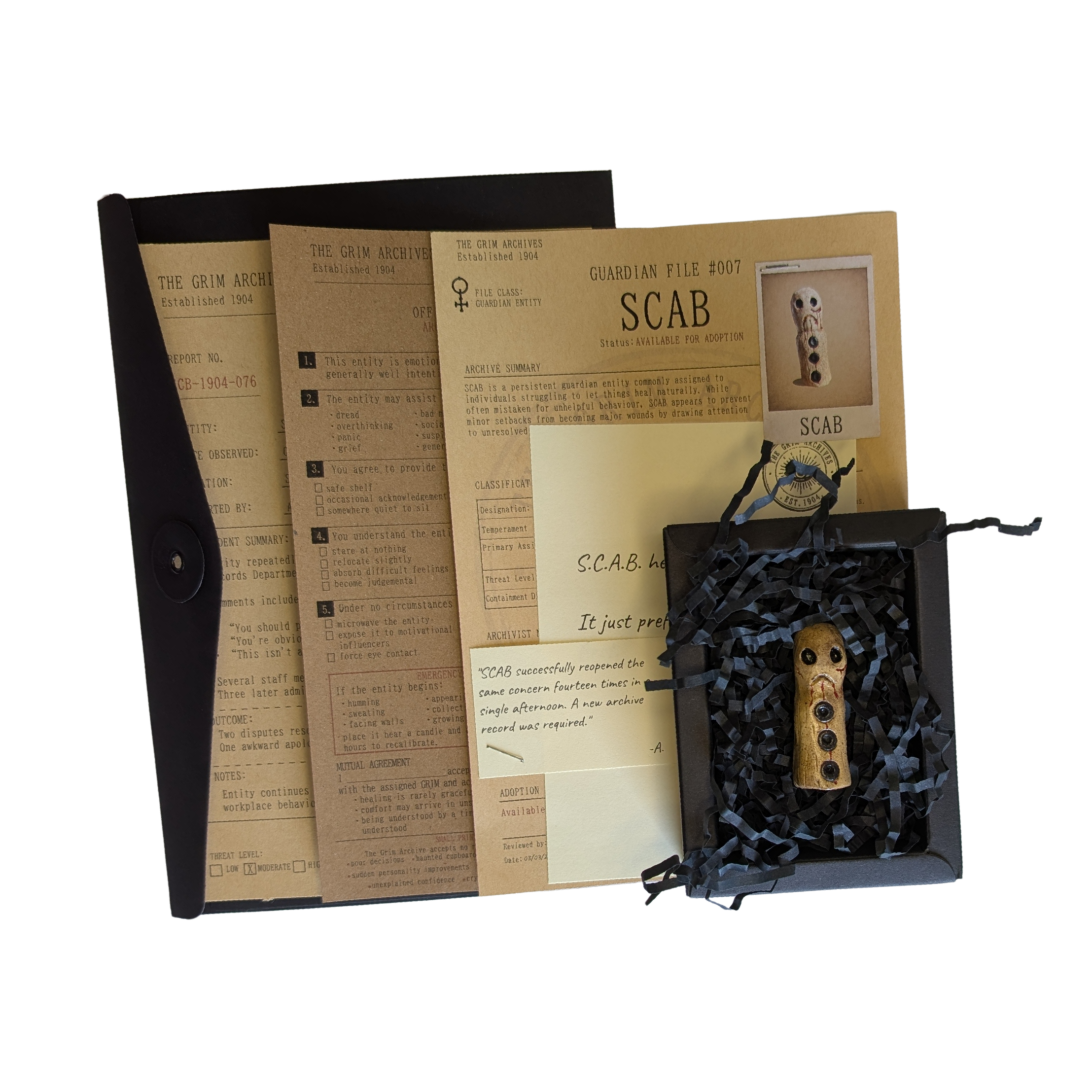 SCAB with its complete Grim Archives paperwork, conservation box and recorded effects